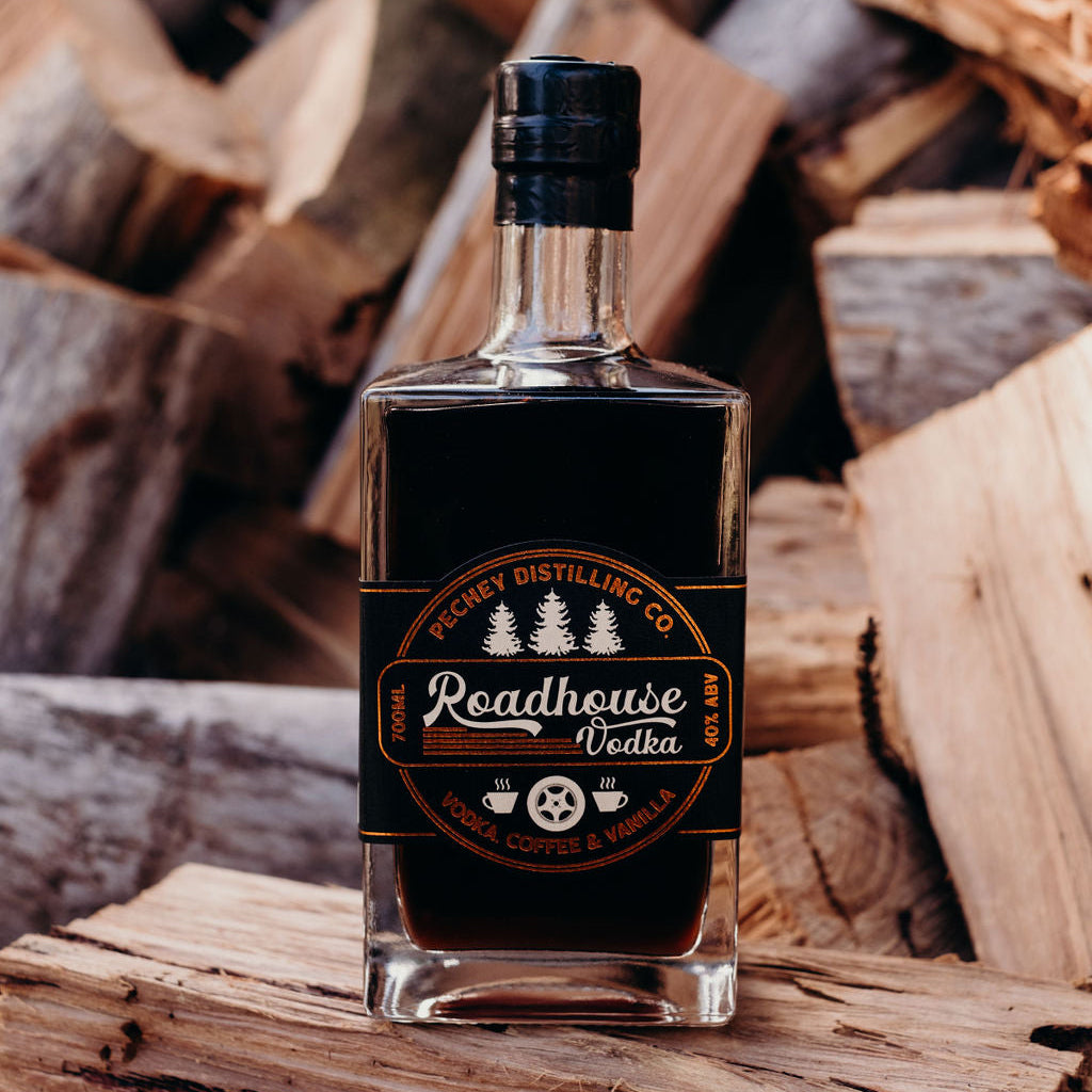 Bottle of Roadhouse Vodka on a wooden background